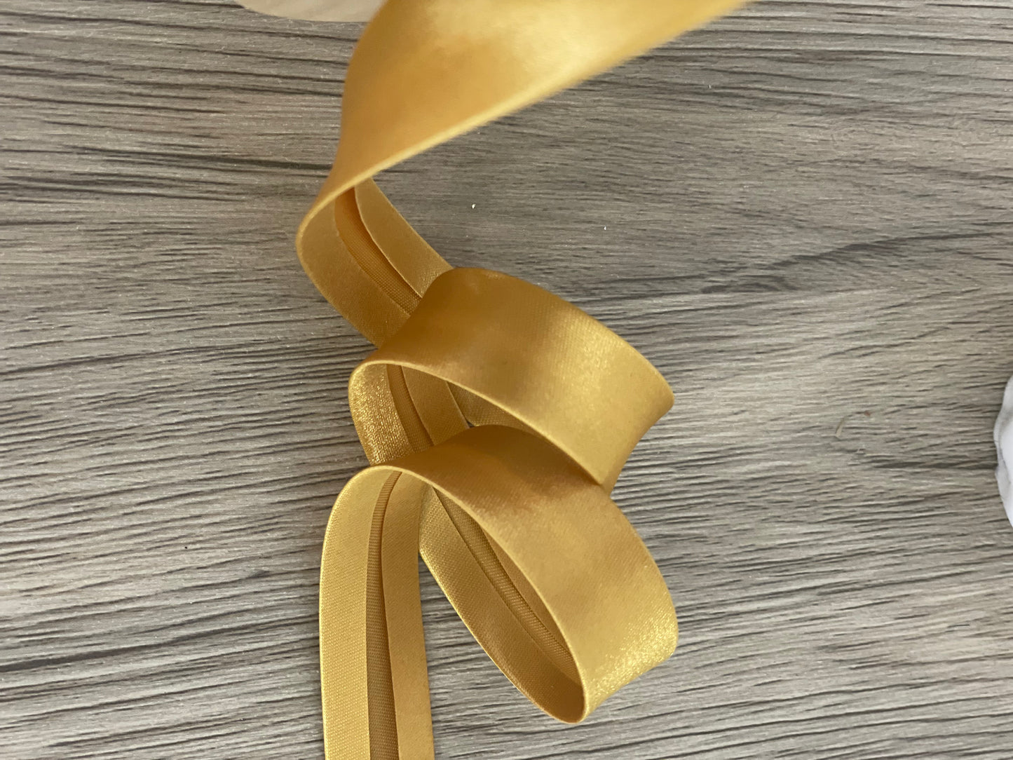 Satin-Schrägband 18mm ocker / gold